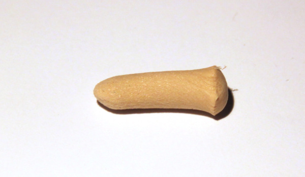 correctly compressed foam ear plug, ready for use